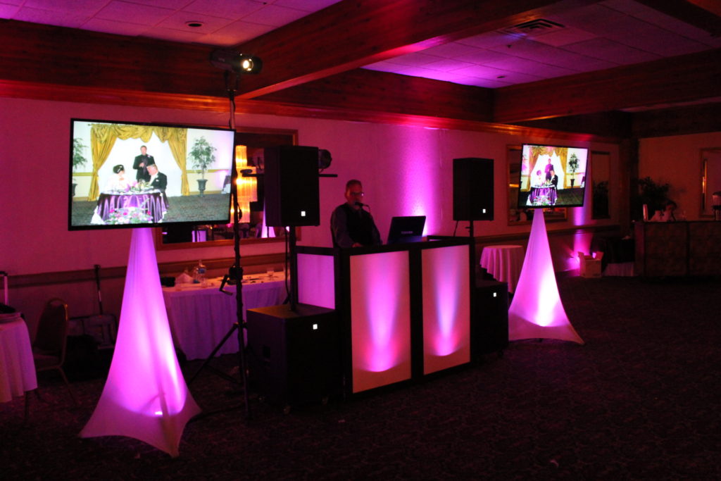 Magenta Lighted Booth and TVs